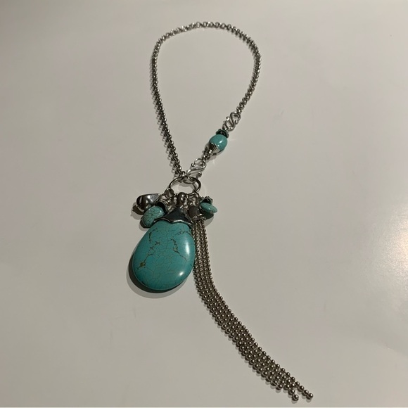 Silver tone and turquoise necklace with oversized pendant and charms. - Picture 4 of 8